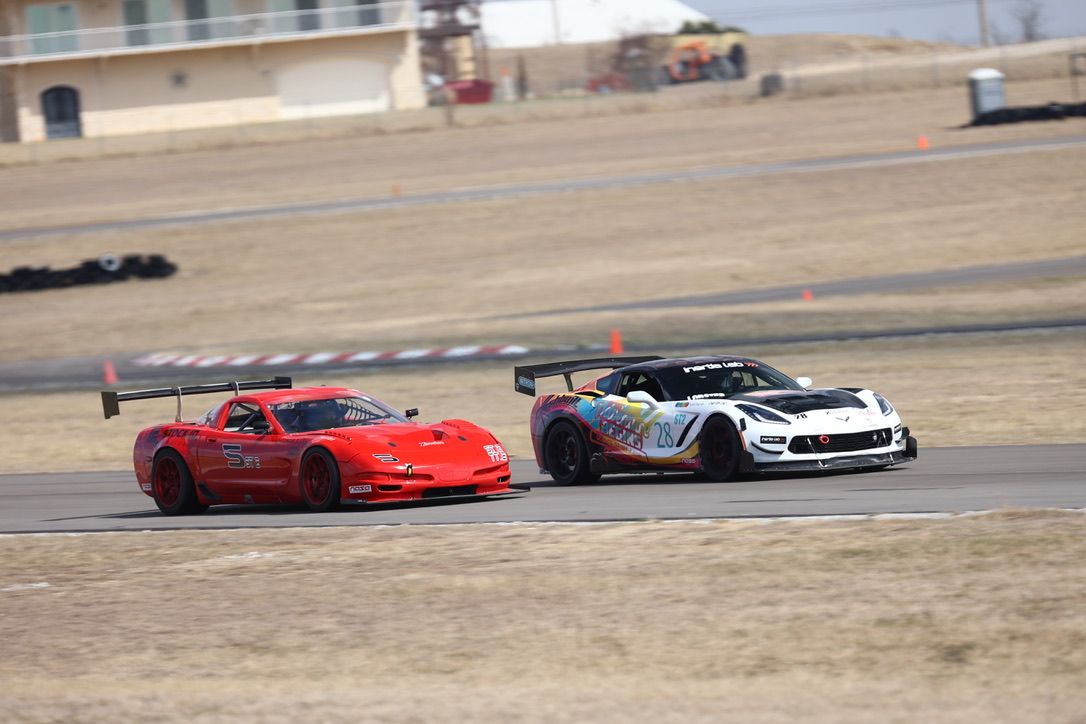 The #28 battling a Corvette C5